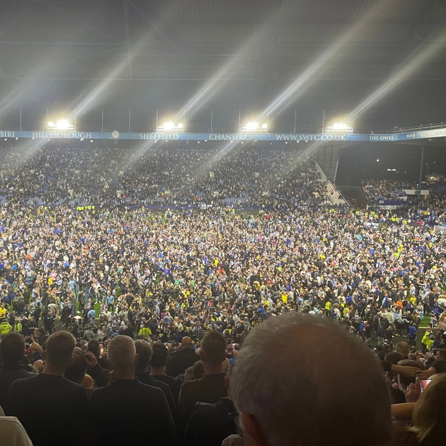 Football ground pitch invasion